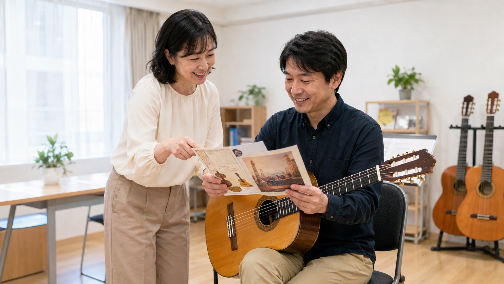発表会について先生に相談する生徒